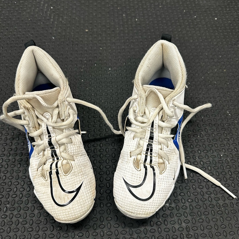 Kids Nike White and Blue football cleats
